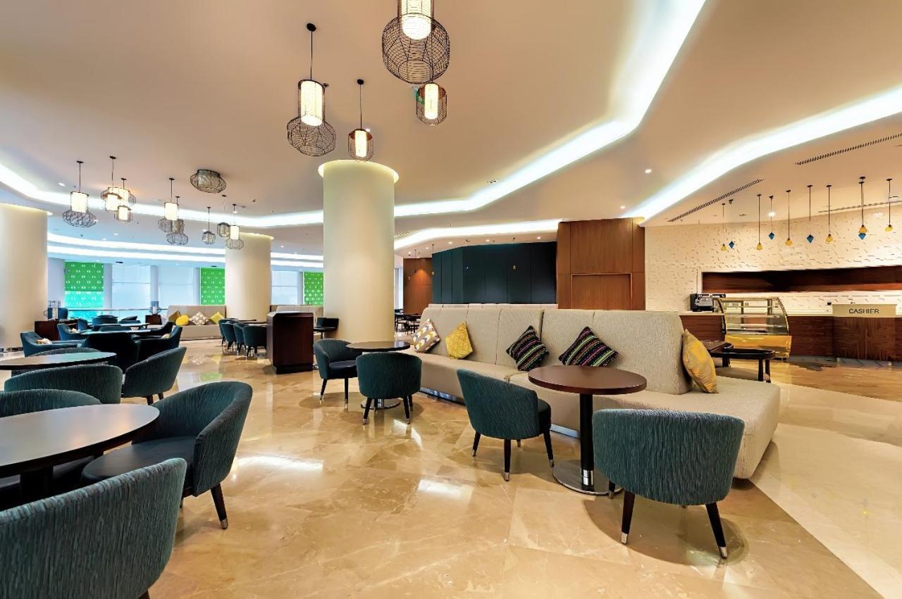 Holiday Suites Al Azizia Mecca ภายนอก รูปภาพ The hotel's lobby