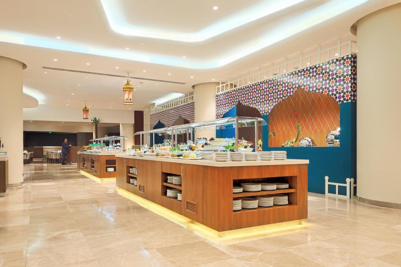 Holiday Suites Al Azizia Mecca ภายนอก รูปภาพ The hotel's restaurant